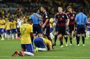Brazil players sink to their knees after the World Cup semifinal soccer match between Brazil and Germany at the Mineirao Stadium in Belo Horizonte, Brazil, Tuesday, July 8, 2014. Germany won the match 7-1. (AP Photo/Martin Meissner)