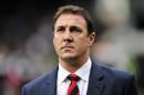 Former Cardiff City boss Malky Mackay allegedly called the club's Malaysian owner Vincent Tan a "chink" in a text message, the Daily Mail newspaper reports