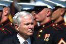Then US Defense Secretary Robert Gates inspects an honour guard during an Armed Forces Farewell Tribute in his honour June 30, 2011 at the Pentagon in Washington, DC