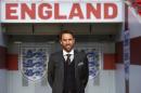 England's new manager Gareth Southgate poses for photographers during a media session at Wembley stadium in London on December 1, 2016