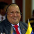 Venezuela's President Hugo Chavez smiles during a working session of the Community of Latin American and Caribbean States, CELAC, summit in Caracas, Venezuela, Saturday, Dec. 3, 2011. (AP Photo/Ariana Cubillos)