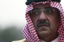Saudi Deputy Interior Minister Prince Mohammed bin Nayef bin Abdul Aziz listens to the national anthem in Mecca