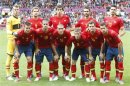 The Spanish team poses for photos before the Spain - Morocco football match in men's Group D football at the London 2012 Olympic Games at Old Trafford in Manchester