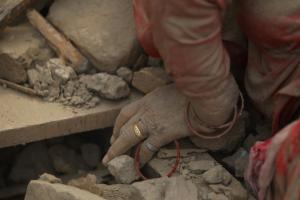 The hand of a dead woman is seen after rescue workers &hellip;