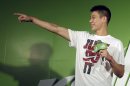 NBA sensation Jeremy Lin attends a promotional event during his Taipei tour in downtown Taipei