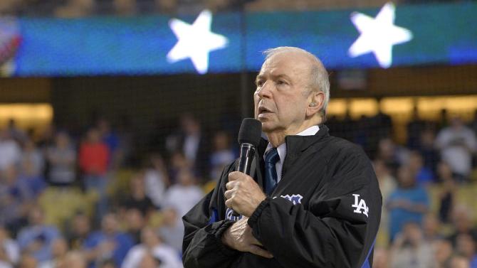 FILE - In this Sept. 18, 2015, file photo, Frank Sinatra, Jr. sings the national anthem prior to a baseball game between the Los Angeles Dodgers and the Pittsburgh Pirates in Los Angeles. Sinatra Jr., who carried on his famous father&#39;s legacy with his own music career, has died. He was 72. The Sinatra family said in a statement to The Associated Press that Sinatra died unexpectedly Wednesday, March 16, 2016, of cardiac arrest while on tour in Daytona Beach, Fla. (AP Photo/Mark J. Terrill)