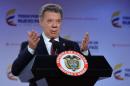 Colombian President Juan Manuel Santos speaks during a press conference at Narino Palace in Bogota on October 3, 2016