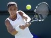 Sara Errani of Italy returns a shot against Johanna Larsson of Sweden during their match at the BNP Paribas Open WTA tennis tournament in Indian Wells, California