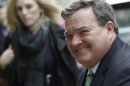 Canada's Finance Minister Jim Flaherty arrives for the Global Investment Conference 2013 in London