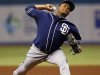San Diego Padres starting pitcher Edinson Volquez throws during the first inning of a baseball game against the Tampa Bay Rays, Friday, May 10, 2013, in St. Petersburg, Fla. (AP Photo/Mike Carlson)