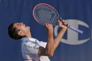 Guillermo Garcia-Lopez, of Spain, reacts after defeating Donald Young 6-7 (4), 6-3, 7-6 (6) in a match at the Winston-Salem Open tennis tournament in Winston-Salem, N.C., Wednesday, Aug. 20, 2014. (AP Photo/Chuck Burton)