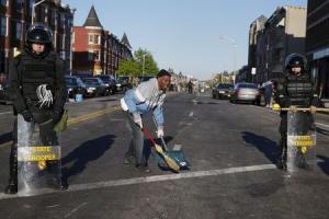 A man cleans up Pennsylvania avenue as Maryland State …