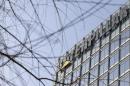 The company logo is seen on top of a building, where Caterpillar Investment Co., Ltd. is located, in Beijing