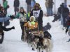 Lindner's team races down Cordova Street during the ceremonial start to the Iditarod dog sled race in downtown Anchorage, Alaska