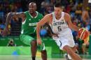 Lithuania's Mantas Kalnietis (R) tries to pass Nigeria's Al-Farouq Aminu during their men's Group B basketball match, at the Rio 2016 Olympic Games, on August 9