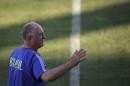 Brazil's coach Luiz Felipe Scolari gestures as he arrives for a training session in Fortaleza, Brazil, Thursday, July 3, 2014. Brazil will face Colombia on Friday in a quarterfinal soccer match at the World Cup. (AP Photo/Felipe Dana)