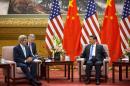 Secretary of State John Kerry, left, meets with Chinese President Xi Jinping