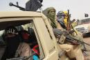 Fighters of the Islamic group Ansar Dine at the Kidal Airport in northern Mali