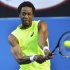 Gael Monfils of France hits a return to Lu Yen-Hsun of Taiwan during their men's singles match at the Australian Open tennis tournament in Melbourne