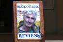 A video screengrab shows a picture of French hostage Herve Gourdel, placed outside the town hall in Saint-Martin-Vésubie, on September 22, 2014