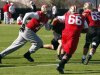 San Francisco 49ers tackle Joe Staley, guard Joe Looney, and guard Al Netter work on blocking drills during a NFL Super Bowl XLVII football practice in New Orleans