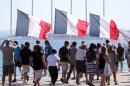 French flags at half-mast line the seafront in Nice following the Bastille Day attack