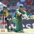 Pakistan's wicket keeper Akmal watches South Africa's Ingram as he plays a shot during their One day International cricket match in Bloemfontein
