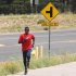Guor Marial, 28, runs along a street in Flagstaff, Arizona