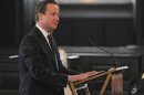 Britain's Prime Minister David Cameron delivers a reading during a service to mark the 20th anniversary of the murder of teenager Stephen Lawrence, at St Martin-in-the-Fields church in London