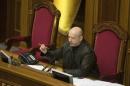 Newly elected speaker of parliament Oleksander Turchynov attends a session of the Ukrainian parliament in Kiev