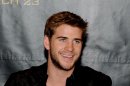 http://urls.re/tmv .Hunger Games: Liam Hemsworth Injures Knee Shooting Catching Fire, Promises 'Much More Action' In Upcoming Film