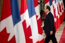 French President Francois Hollande arrives for a press conference on November 3, 2014 in Ottawa