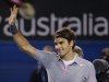 Switzerland's Roger Federer waves to the crowd after his fourth round win over Canada's Milos Raonic at the Australian Open tennis championship in Melbourne, Australia, Monday, Jan. 21, 2013. (AP Photo/Dita Alangkara)