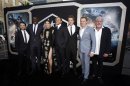 Cast members Charlie Day, Idris Elba, Rinko Kikuchi, Charlie Hunnam, Robert Kazinsky, Diego Klattenhoff and Ron Perlman pose at the premiere of "Pacific Rim" at Dolby theatre in Hollywood