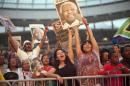 People enjoy the Nelson Mandela tribute concert, called, " A life celebrated", at Cape Town Stadium on December 11 2013, in Cape Town, South Africa