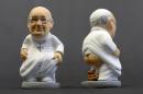 Ceramic figurines of Pope Francis called "Caganers" are pictured during their presentation in Torroella de Montgri, near Gerona on November 15, 2013