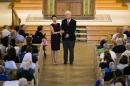 Diane and John Foley, parents of James Foley, address the congregation during a Catholic mass at Our Lady of the Holy Rosary parish August 24, 2014, in Rochester, New Hampshire