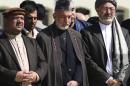 Afghan President Karzai and Vice Presidents Fahim and Khalili attend the funeral ceremony of slain former president Rabbani, at the presidential palace in Kabul