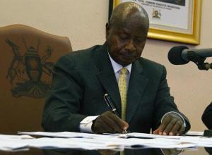 Uganda's President Yoweri Museveni signs the Anti-Homosexuality …