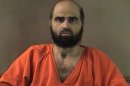 FILE - This undated file photo provided by the Bell County Sheriff's Department shows Nidal Hasan, the Army psychiatrist charged in the deadly 2009 Fort Hood shooting rampage that left 13 dead. Hasan will represent himself at his upcoming murder trial, meaning he will question the more than two dozen soldiers he's accused of wounding, a military judge ruled Monday, June 3, 2013. (AP Photo/Bell County Sheriff's Department, File)