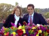 In this photo provided by Hannah Storm, ESPN anchor Hannah Storm, left, poses for a photo with co-host Josh Elliott, anchor for ABC's Good Morning America, on the parade grounds of the Rose Parade on Tuesday, Jan. 1, 2013, in Pasadena, Calif. Storm hosted the Rose Parade telecast Tuesday in her first on-air appearance since sustaining first- and second-degree burns to her face, hands, chest and neck in a propane gas grill accident Dec. 11. (AP Photo/Courtesy Hannah Storm)
