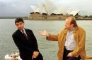 ROWAN ATKINSON AND MEL SMITH POSE WITH OPERA HOUSE BEHIND IN SYDNEY