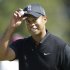 Tiger Woods reacts after making a birdie on the 10th hole during the second round of the U.S. Open Championship golf tournament Friday, June 15, 2012, at The Olympic Club in San Francisco. (AP Photo/Ben Margot)