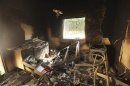 An interior view of the damage at the U.S. consulate, which was attacked and set on fire by gunmen yesterday, in Benghazi