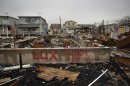 The foundation of a home devastated by fire and the effects of Hurricane Sandy is seen in the Breezy Point section of the Queens borough in New York