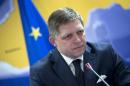 FILE - In this Thursday March 6, 2014 file photo, Slovakian Prime Minister Robert Fico listens to questions during a media conference after an EU summit in Brussels. Slovakia's presidential runoff on Saturday March 29, 2014, pits the country's best-known politician, a prime minister whose party has a lock on parliament, against a businessman-turned philanthropist who is hoping to capitalize on a corruption scandal that reached up into high levels of government. (AP Photo/Virginia Mayo, File)