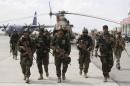 Afghan security forces arrive at the Kunduz airport