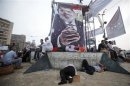Supporters of deposed Egyptian President Mohamed Mursi sleep at the Rabaa Adawiya square where they are camping in Cairo