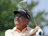 Ken Duke watches his tee shot on the second hole during the final round of the Travelers Championship golf tournament in Cromwell, Conn., Sunday, June 23, 2013. (AP Photo/Fred Beckham)