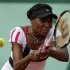 Williams of the U.S. returns the ball to Ormaechea of Argentina during the French Open tennis tournament at the Roland Garros stadium in Paris